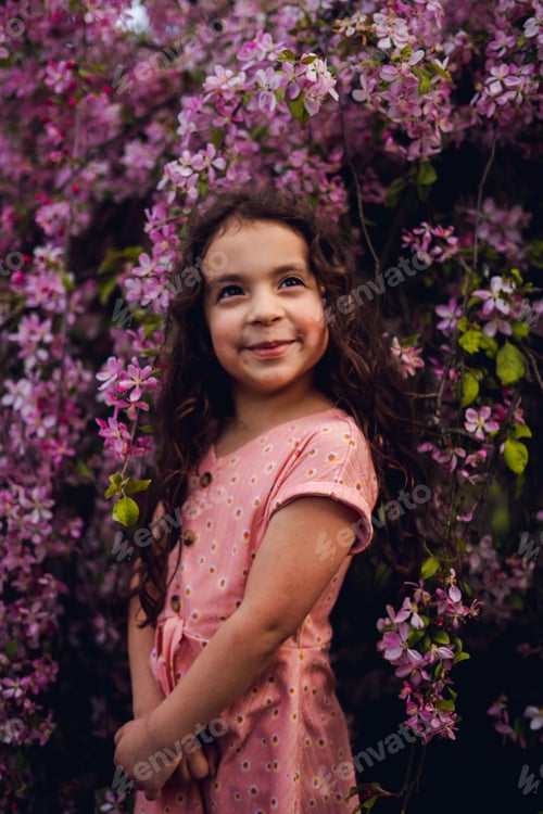 Preview: Smiling girl in the flowers
