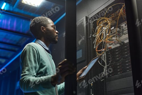 Preview: African American Network Engineer Setting Up Server