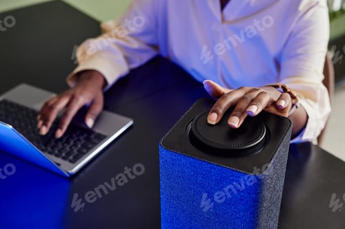 Preview: Woman using Smart Speaker Closeup
