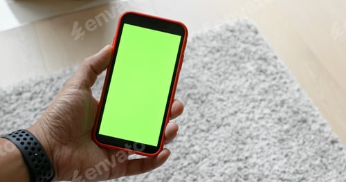 Preview: Man hold with green screen on cellphone