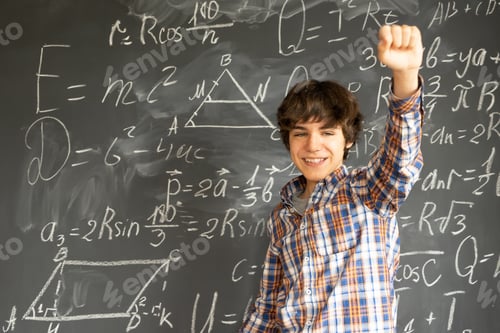 Preview: Boy writting on black board