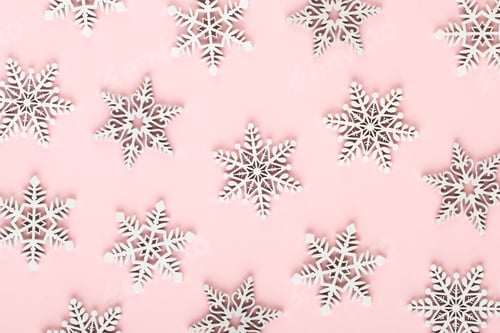 Preview: Christmas background. White snow decorations on a pink background.