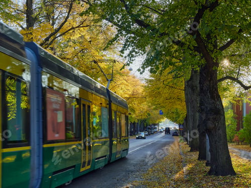 Preview: Tram in European city in autumn.