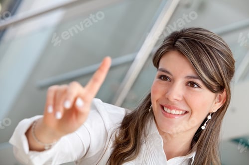 Preview: Business Woman Pressing An Imaginary Button And Smiling