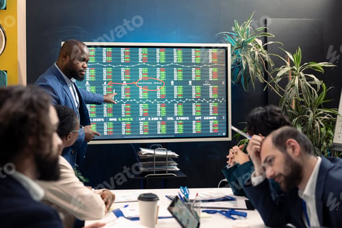 Preview: Workers team analyzing statistics to offer solutions on an issue