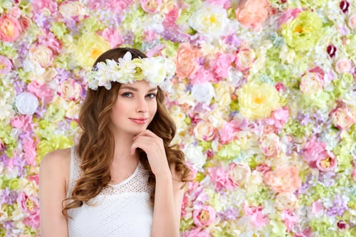 Preview: attractive young woman in floral wreath