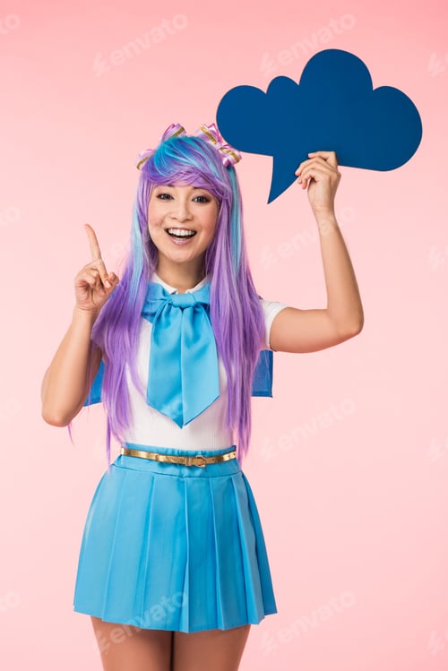 Preview: Excited asian anime girl holding blue thought bubble and showing idea sign on pink