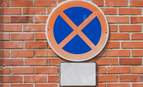 Preview: No Stopping sign on a red brick wall