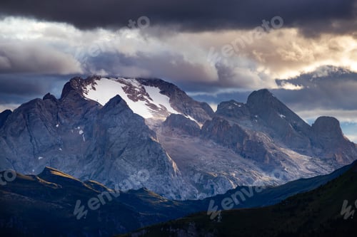 Preview: Marmolada Peak - 3343meters, the highest mountain in the Dolomites, Italy, with dramatic sky and fog