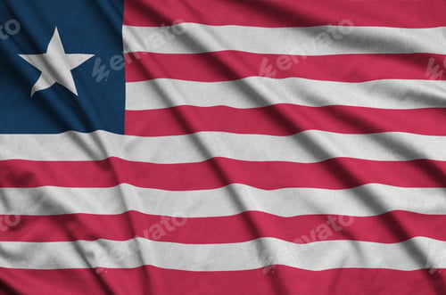 Preview: Liberia flag is depicted on a sports cloth fabric with many folds. Sport team waving banner
