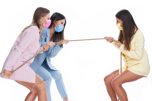 Preview: Three women in pastel suits pulling rope over white background