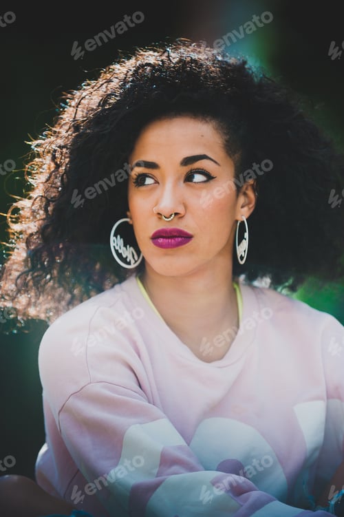 Preview: Portrait of modern ethnic woman with curls