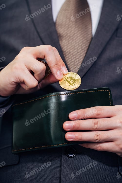 Preview: Close-up of businessman with wallet receiving and paying by bitcoin or cryptocurrency