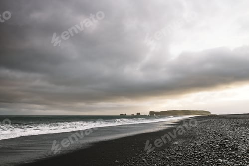 Preview: View of Cape Dyrholaey Reynisfjara beach with black volcanic sand, Iceland