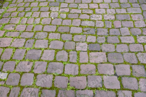 Preview: Stone paved floor background texture. Cobblestone grey footpath above view