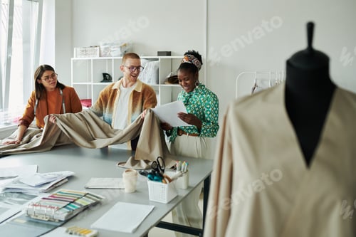 Preview: Looking at colleague with sketches