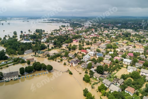Preview: Aerial view of flooded houses with dirty water of Dnister river in Halych town, western Ukraine.