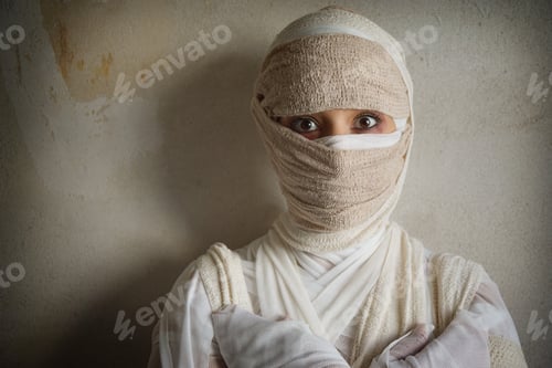 Preview: woman wrapped in bandages