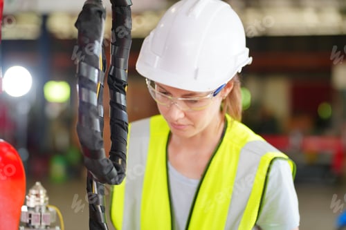 Preview: Industrial Engineer at work in factory