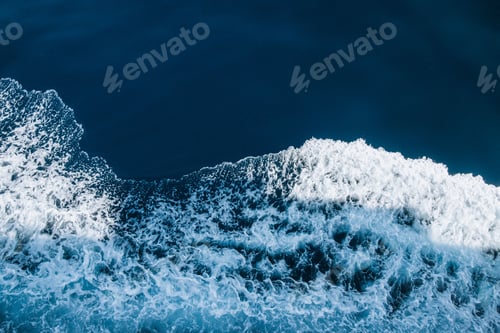 Preview: Aerial view of sea waves breaking beach