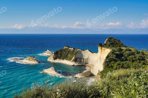 Preview: Scenic view of Cape Drastis in Corfu Island, Greece with the calm blue sea