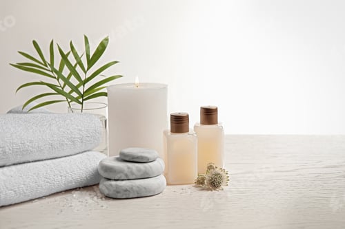 Preview: Composition with spa stones on white wooden table. Space for text