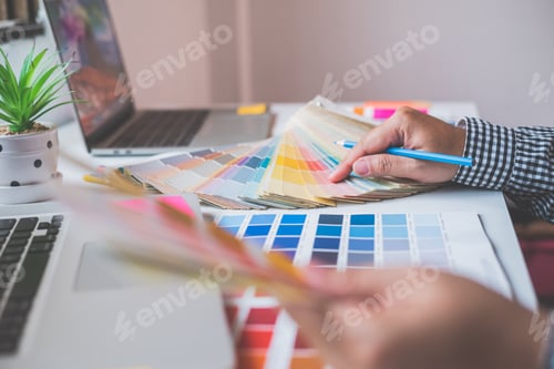Preview: The graphic designer creative team is currently working on the design and color selection