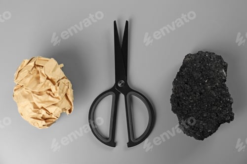 Preview: Flat lay composition with rock, paper and scissors on grey background