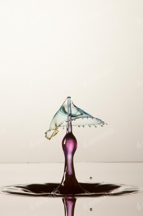 Preview: Splash of colorful liquid with high speed flash