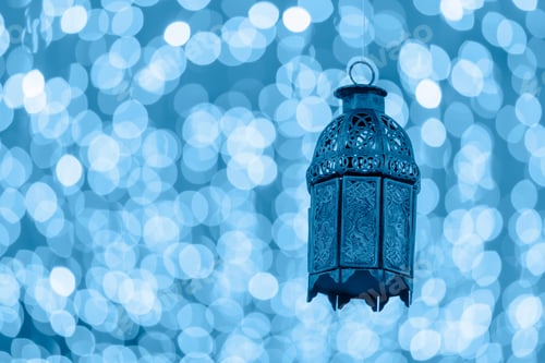 Preview: Traditional Arabic lantern with bokeh background. Ramadan Kareem, Eid Mubarak! Blue monochrome image