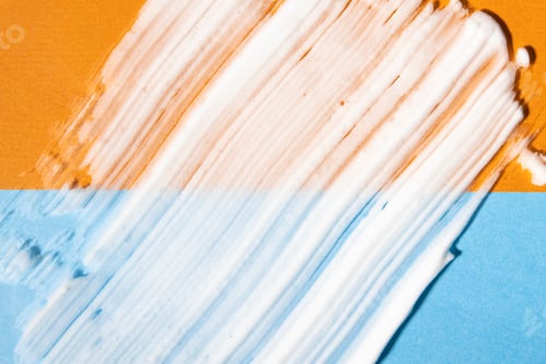 Preview: Body skin care product on a multicolored orange and blue background