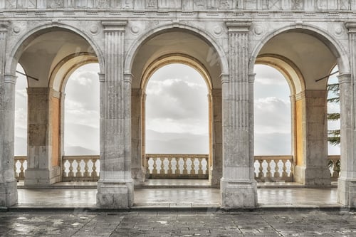 Preview: Empty hallway with arches and columns.