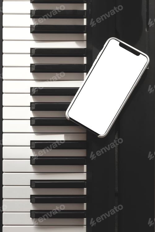 Preview: Mock up screen of a smartphone on electronic piano next to black and white keys. Isolated screen