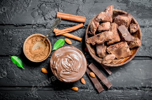 Preview: Chocolate background. Various assortment of chocolate with paste.