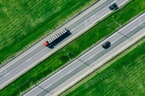 Preview: Aerial drone view of highway asphalt road with cars and truck cargo