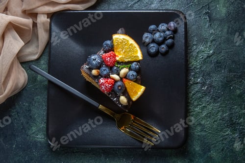 Preview: top view cake slice delicious chocolate cake with fruits inside plate on dark background pies dough
