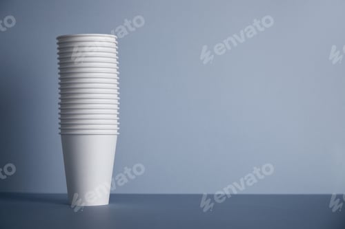Preview: White paper cups isolated on gray mockup set