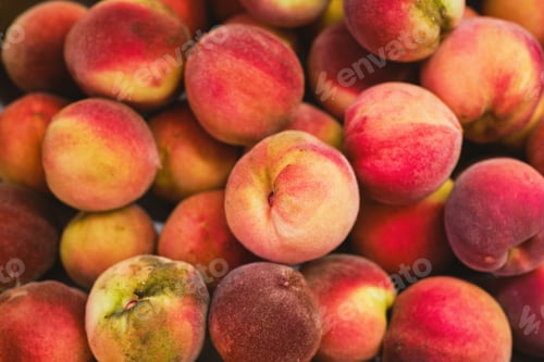 Preview: Juicy peaches in basket, flat lay on freshly picked fruits, gardening