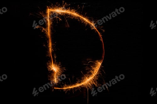 Preview: The English Letter D Made Of Sparklers On Black Background