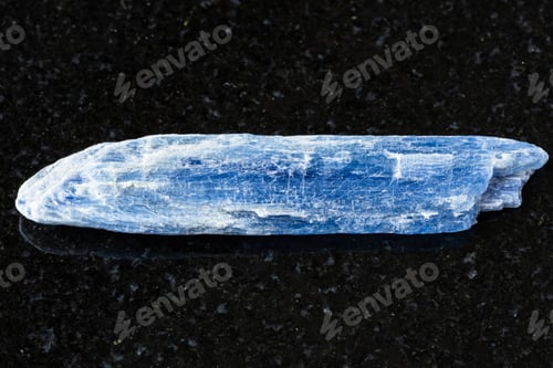 Preview: sample of raw blue kyanite crystal on black