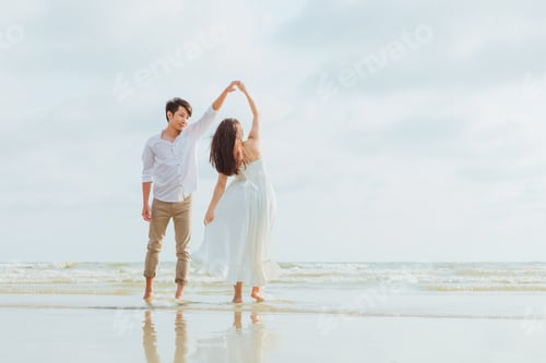 Preview: romantic time loving couple dance on the beach. Love travel concept. Honeymoon concept.
