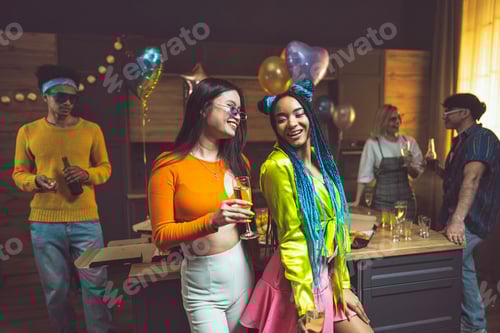 Preview: Group of friends making party at home on new year evening