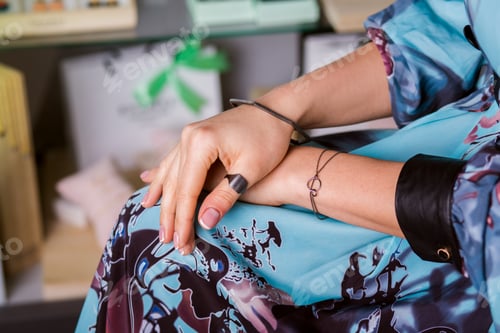 Preview: jewelry, rings, bracelets. Female hands closeup.