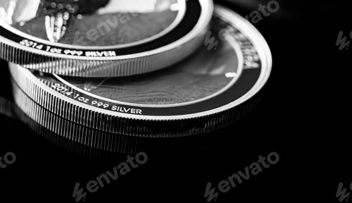 Preview: Close up of Silver Bullion Coin on a black mirror background