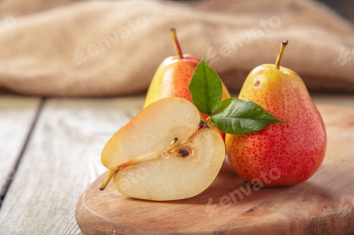 Preview: Ripe pears on rustic wooden table