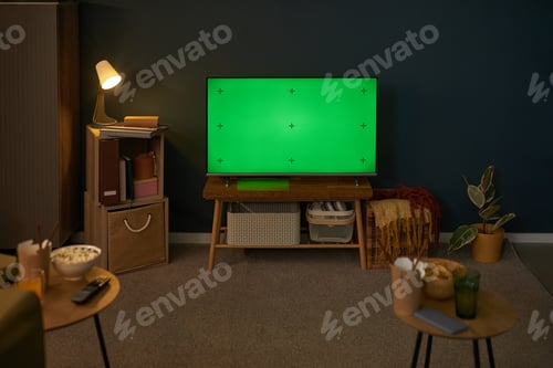 Preview: Modern Living Room Television Displaying Green Screen with Tracking Marks