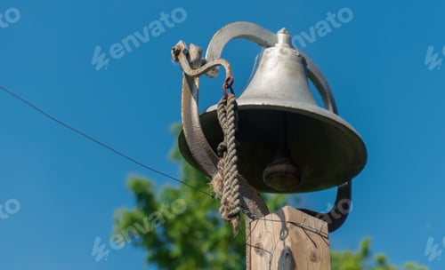 Preview: Big Metal Bell On A Wooden Poll