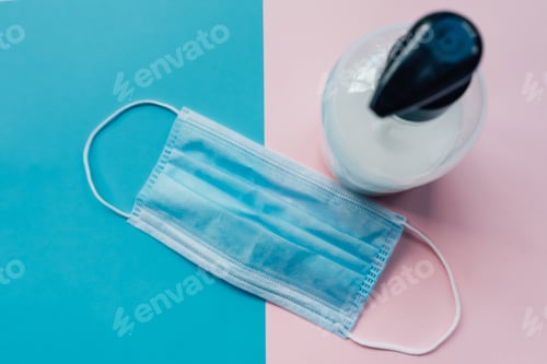 Preview: Hand soap and mask on pink and blue background.