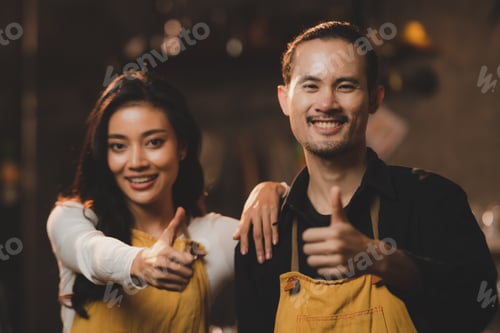 Preview: Asian Cashier is making order on touch screen of computer in cafe or store. Barista receive orders