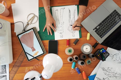 Preview: Fashion Designer Drawing Sketches